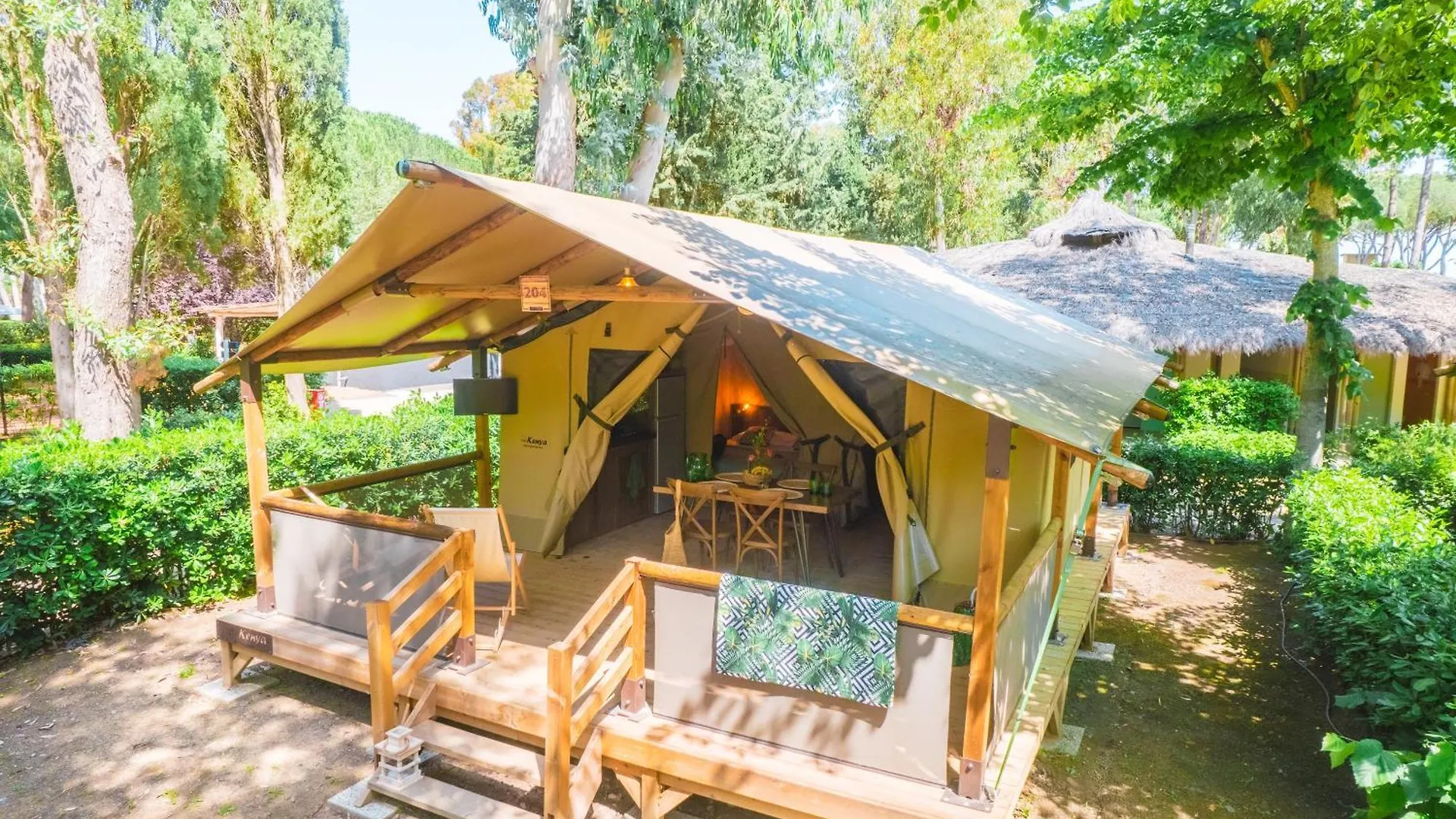 *** Кемпинг Camping Village Le Capanne Биббона Италия